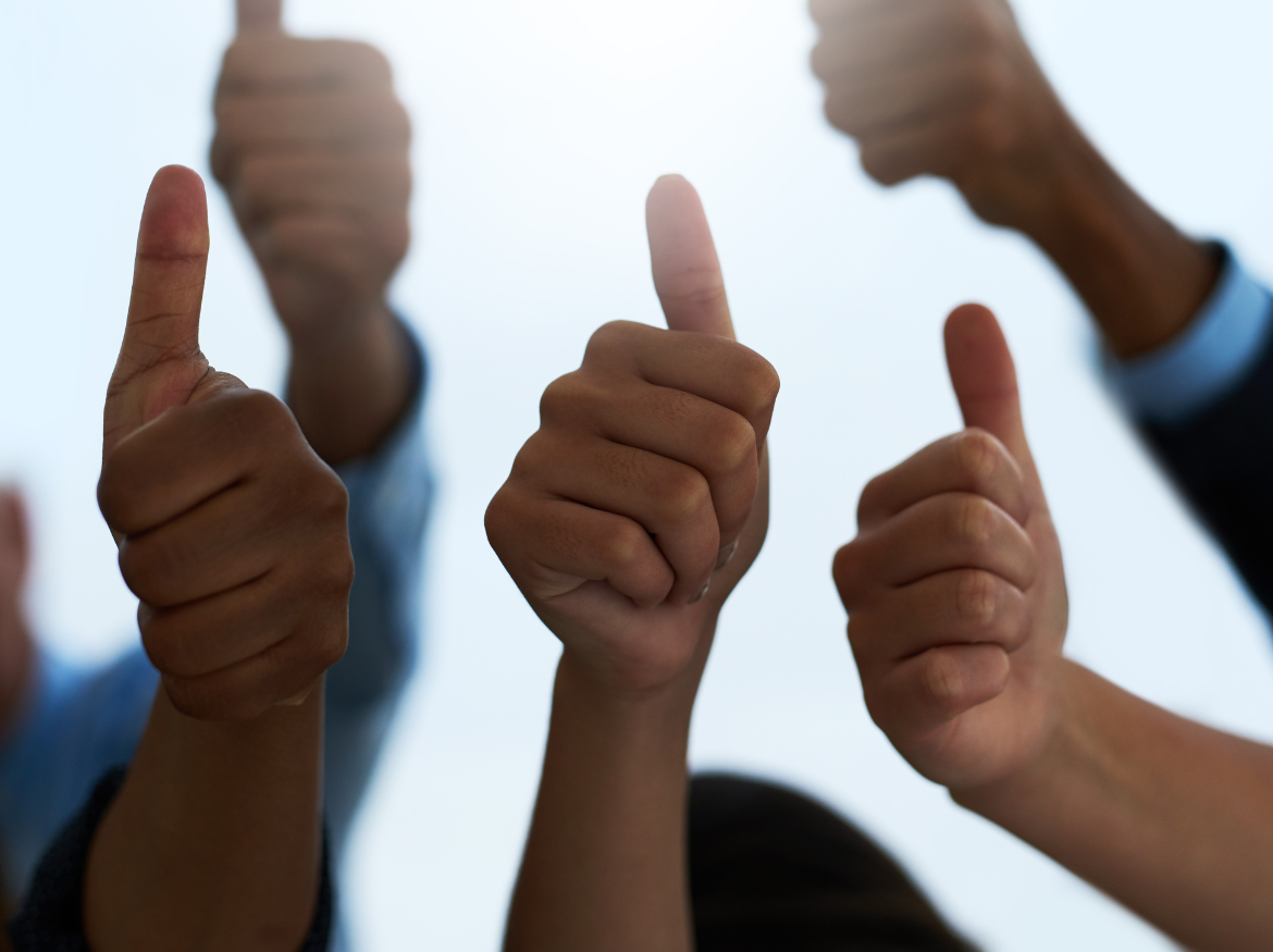 Bodilycoach ger tummen upp, symbol för coachning och community i appen.